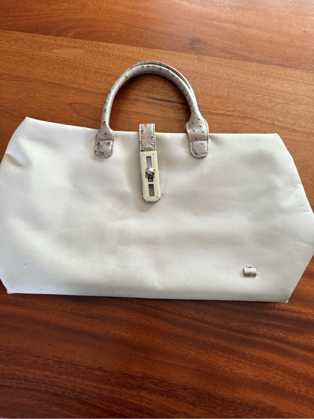La Bagagerie Top-Handle cream Tote with Silver Accents